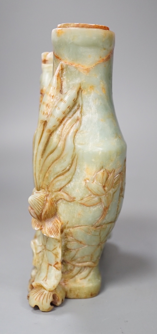 A late 19th century soapstone figural vase. 18cm
